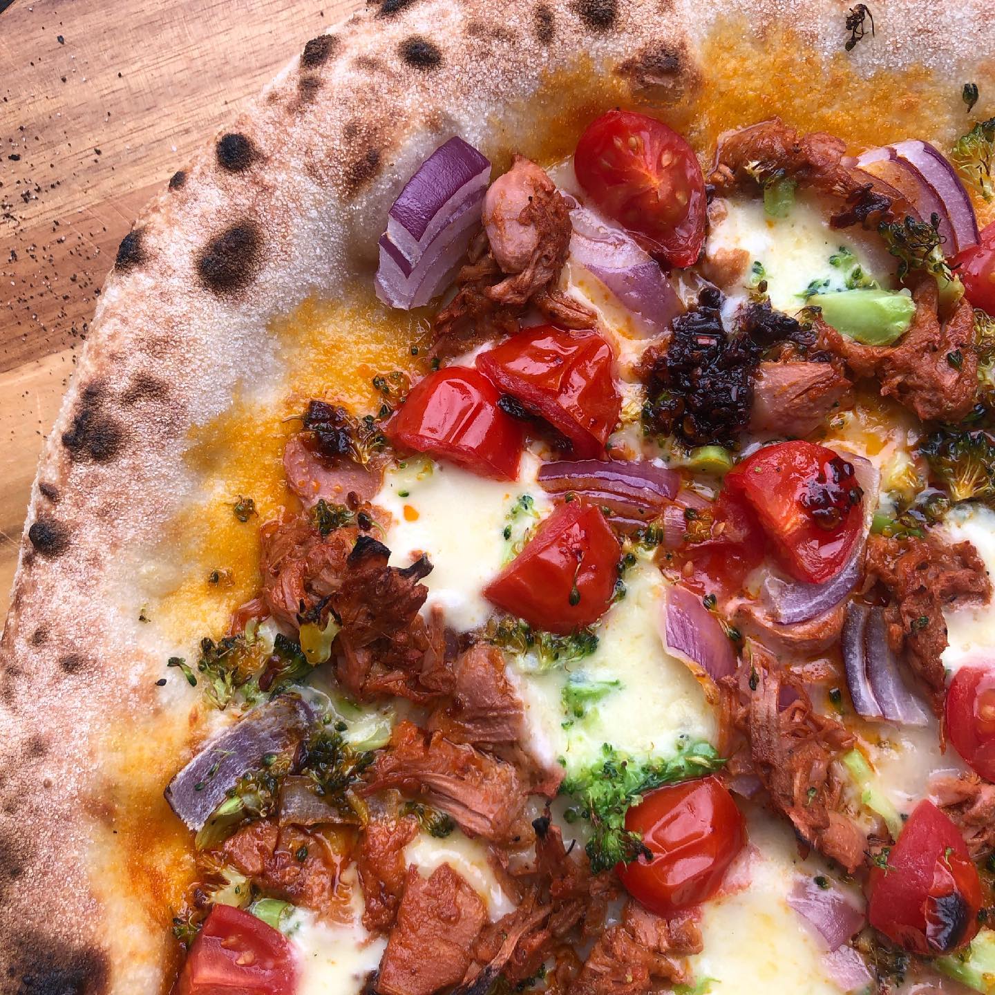 Jackfruit Pizza with Red Onion, Cherry Tomatoes and Broccoli