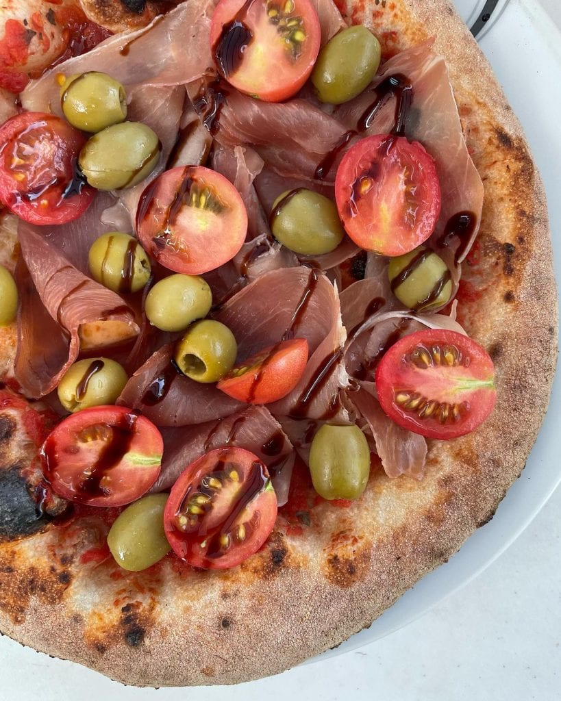 Prosciutto, Olive, and Cherry Tomato Pizza - Post Bake Toppings