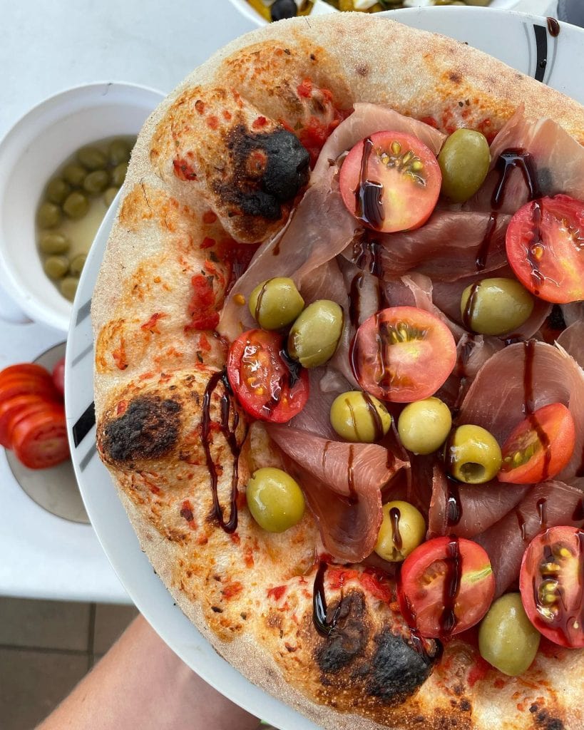 Prosciutto, Olive, and Cherry Tomato Pizza - Post Bake Toppings