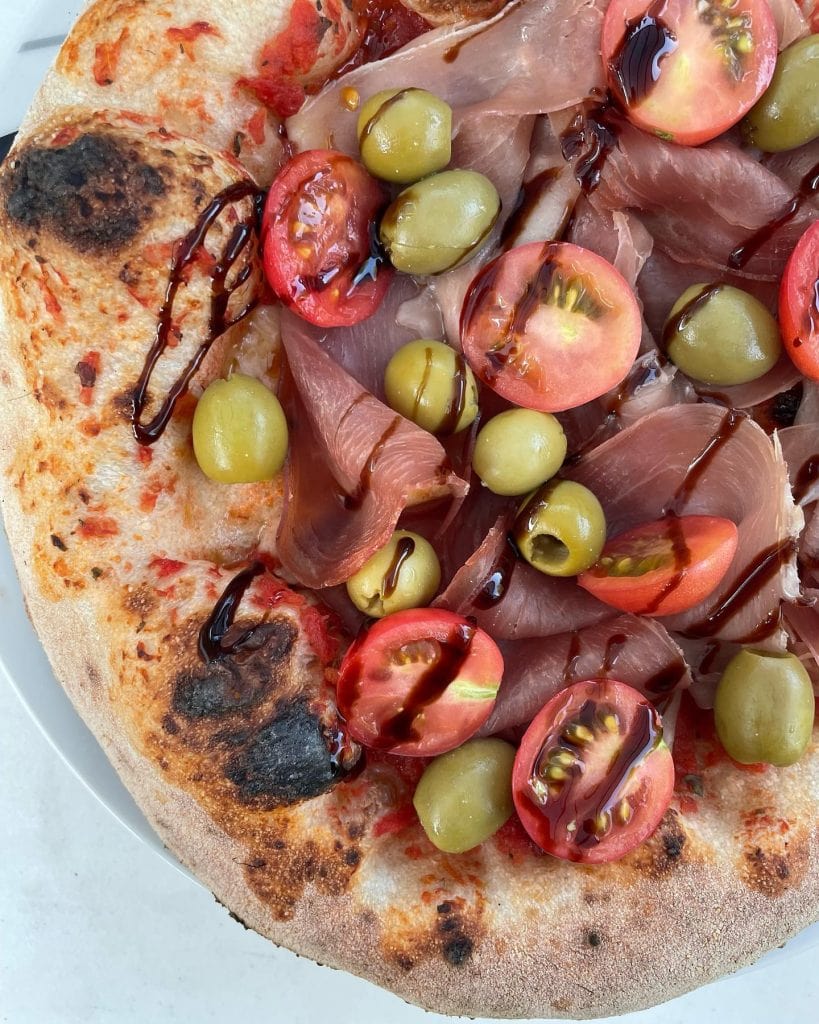 Prosciutto, Olive, and Cherry Tomato Pizza - Post Bake Toppings